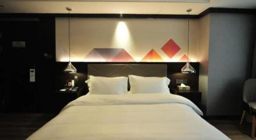 Bed in Borrman Hotel Zhongshan Henglan Xiyong