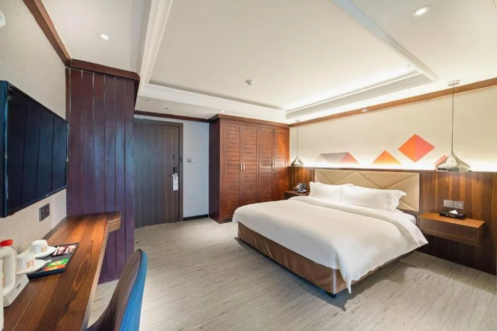 Bed in Borrman Hotel Zhongshan Henglan Xiyong