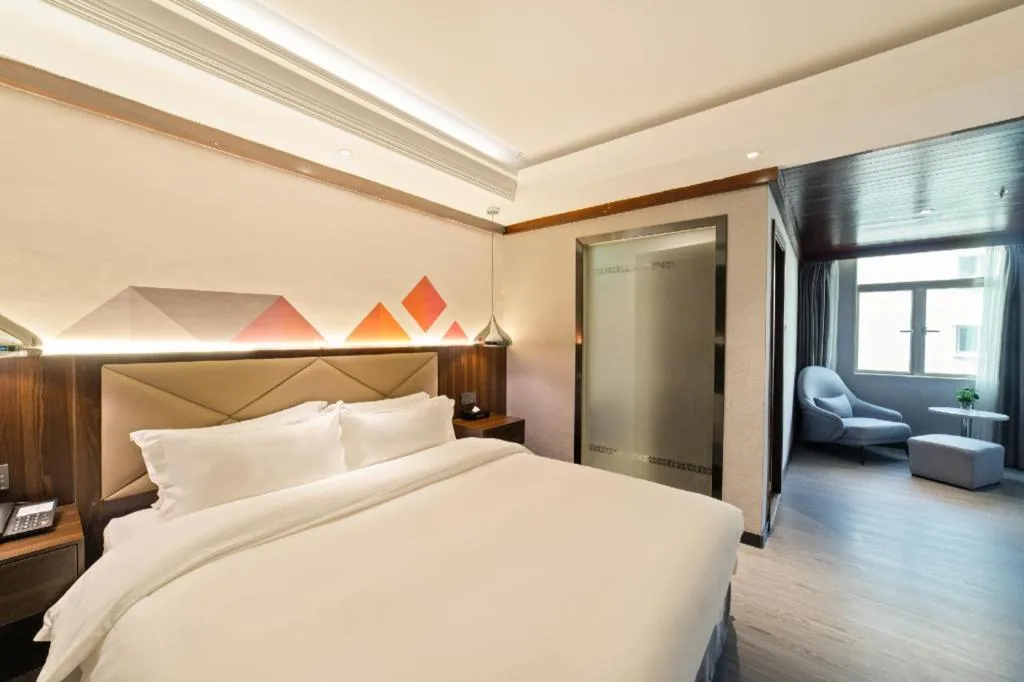 Bed in Borrman Hotel Zhongshan Henglan Xiyong