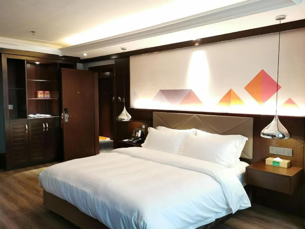 Bed in Borrman Hotel Zhongshan Henglan Xiyong