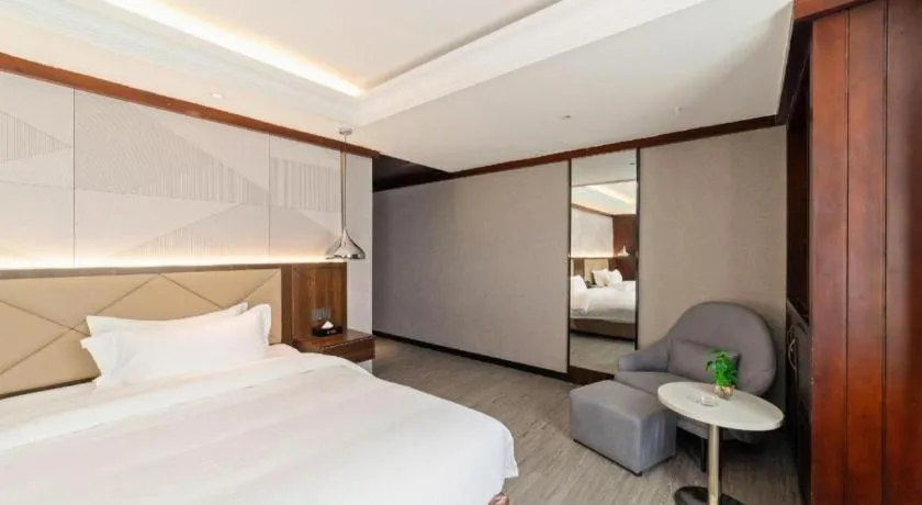 Bed in Borrman Hotel Zhongshan Henglan Xiyong