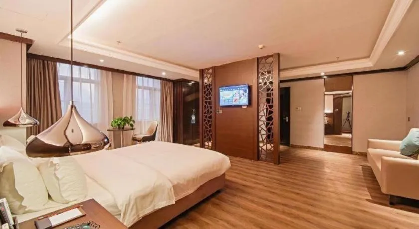 Bed in Borrman Hotel Zhongshan Henglan Xiyong