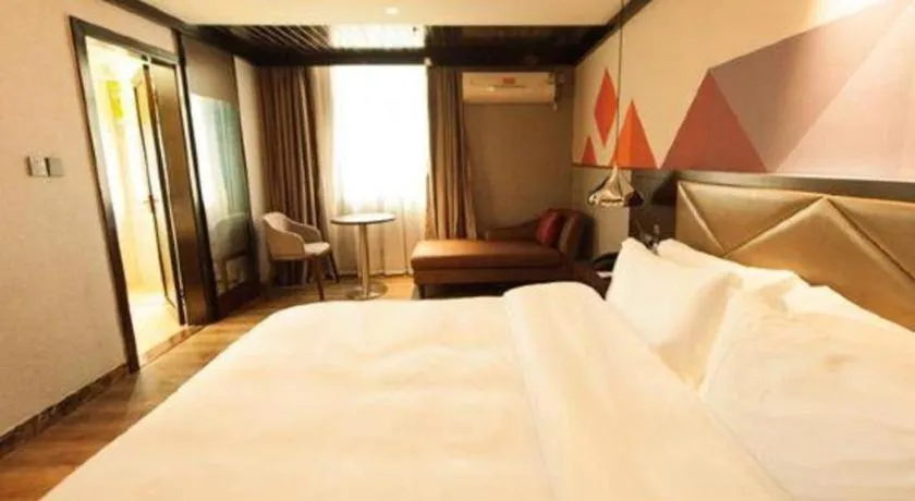 Bed in Borrman Hotel Zhongshan Henglan Xiyong