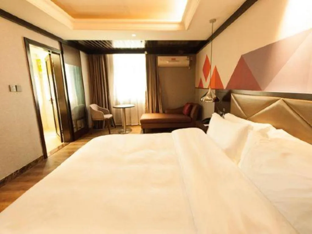 Bed in Borrman Hotel Zhongshan Henglan Xiyong