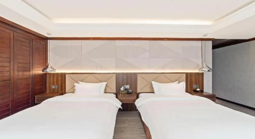 Bed in Borrman Hotel Zhongshan Henglan Xiyong