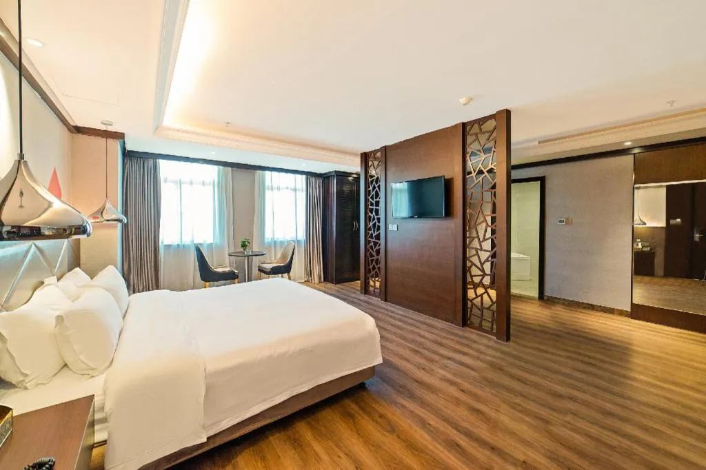 Bed in Borrman Hotel Zhongshan Henglan Xiyong