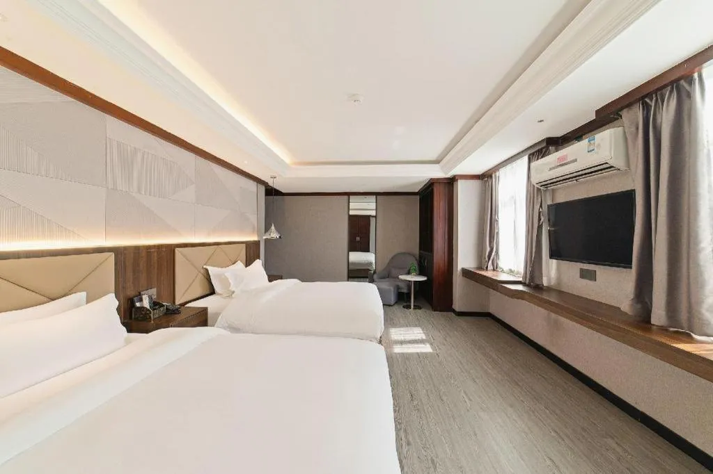 Bed in Borrman Hotel Zhongshan Henglan Xiyong