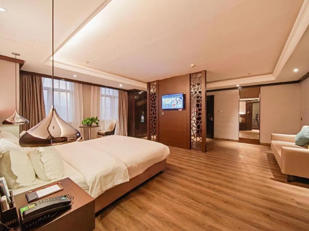 Bed in Borrman Hotel Zhongshan Henglan Xiyong