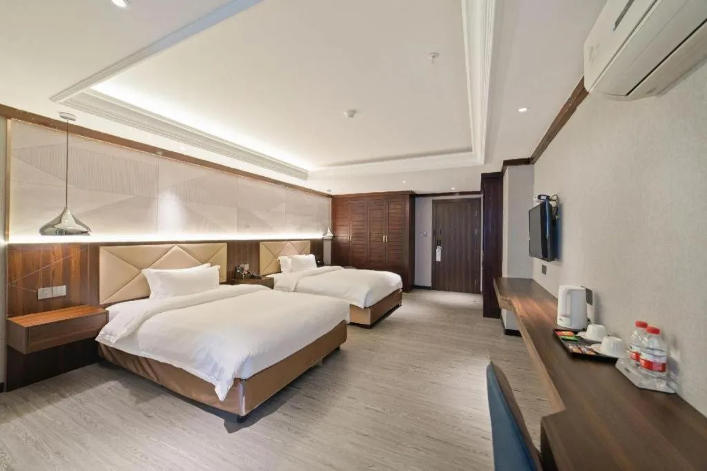 Bed in Borrman Hotel Zhongshan Henglan Xiyong