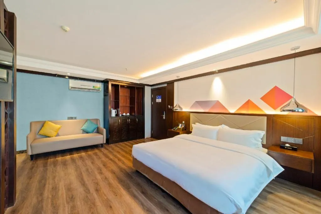 Bed in Borrman Hotel Zhongshan Henglan Xiyong