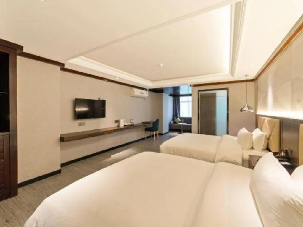 Bed in Borrman Hotel Zhongshan Henglan Xiyong