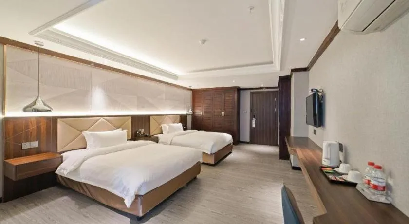 Bed in Borrman Hotel Zhongshan Henglan Xiyong