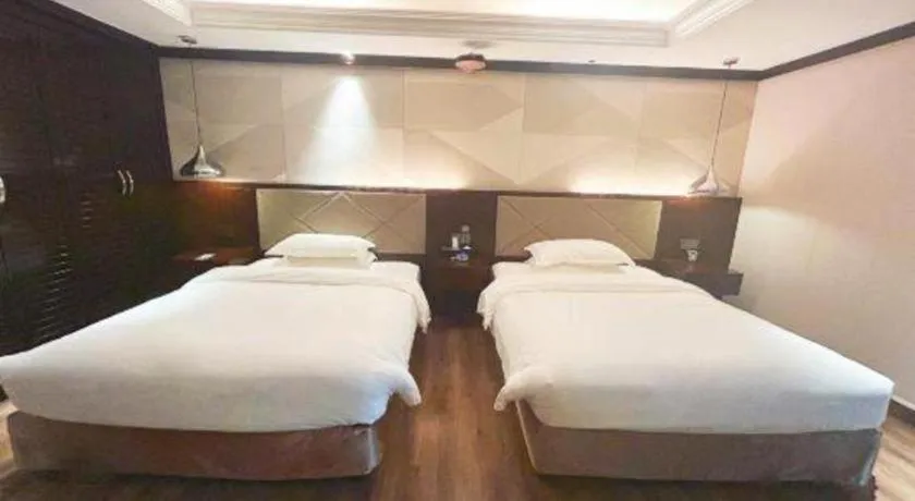 Bed in Borrman Hotel Zhongshan Henglan Xiyong