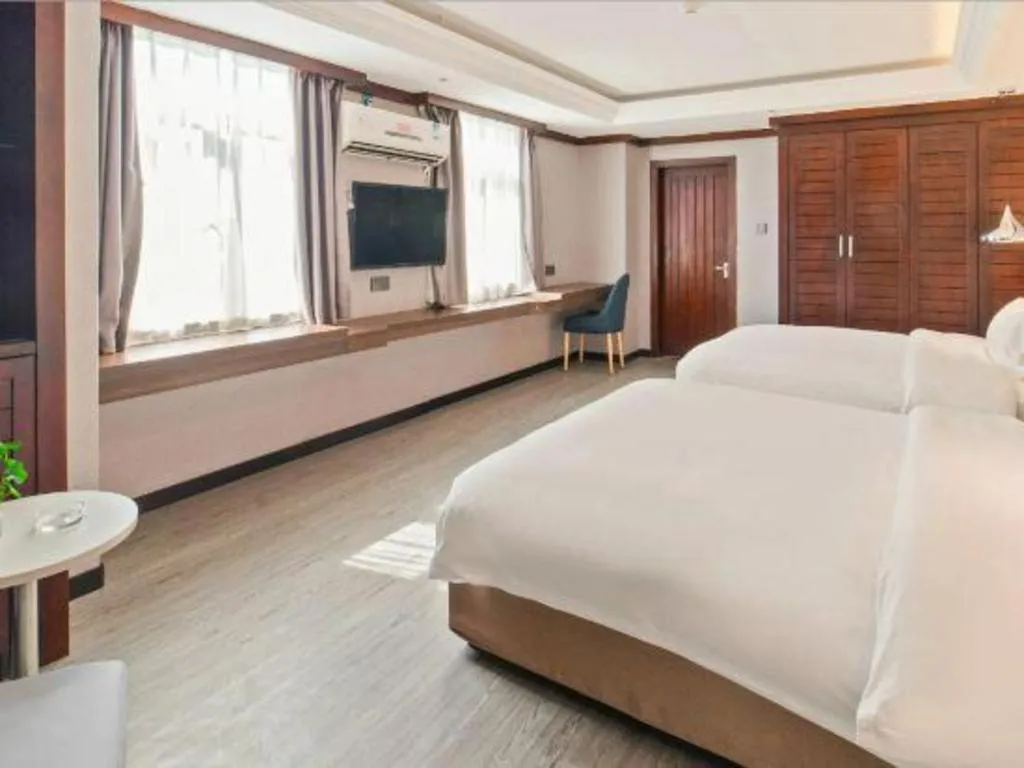 Bed in Borrman Hotel Zhongshan Henglan Xiyong