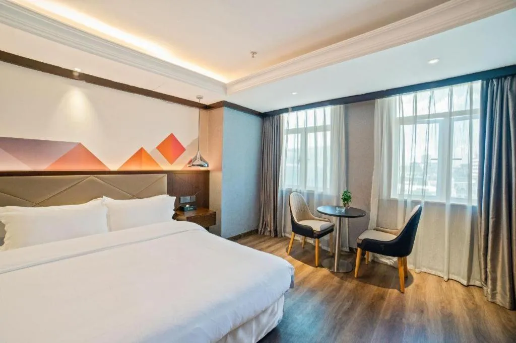 Bed in Borrman Hotel Zhongshan Henglan Xiyong