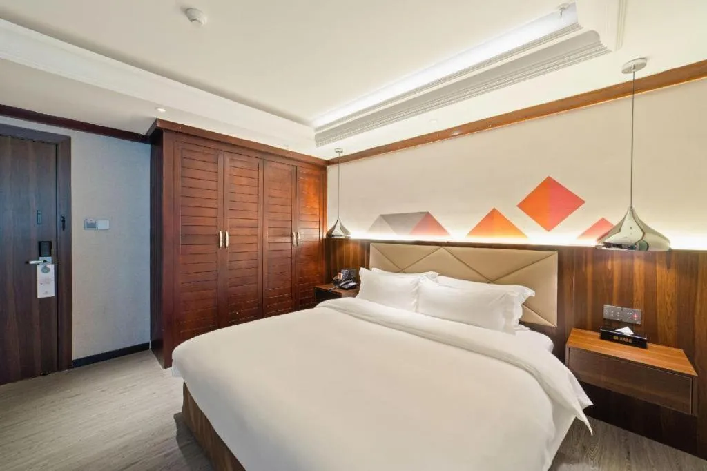 Bed in Borrman Hotel Zhongshan Henglan Xiyong