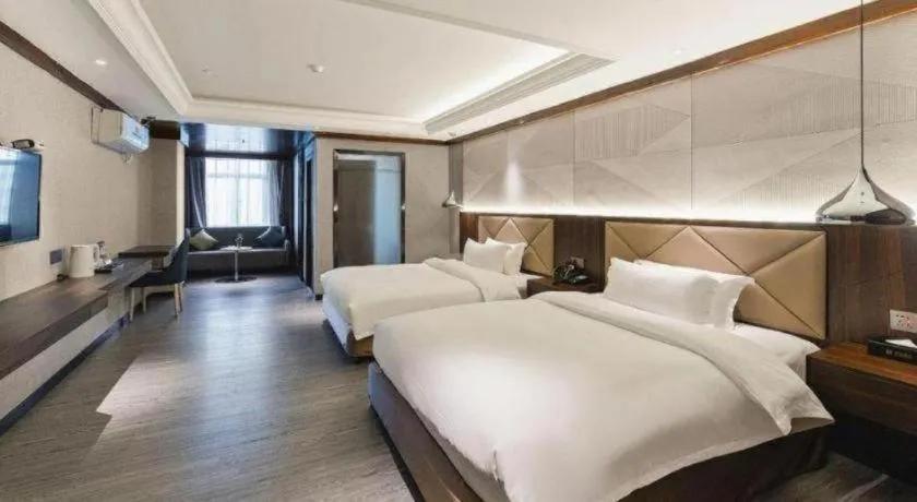 Bed in Borrman Hotel Zhongshan Henglan Xiyong