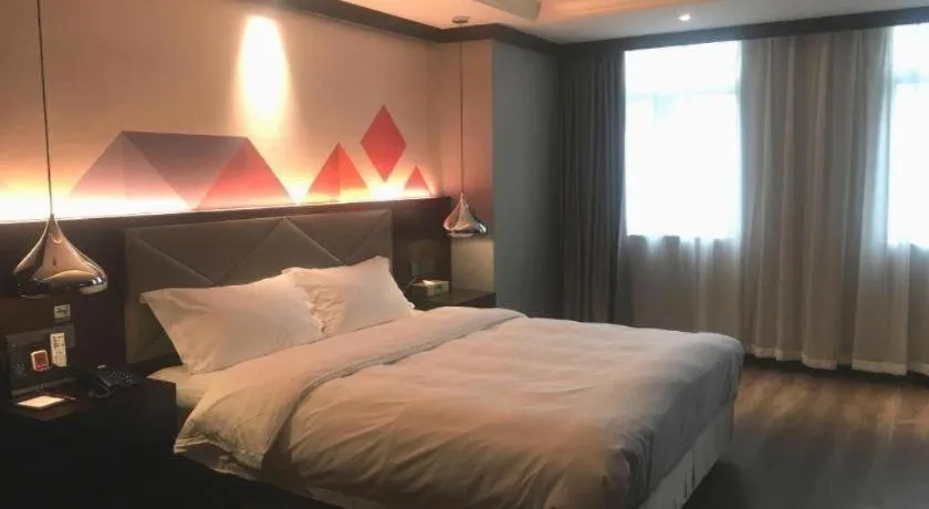 Bed in Borrman Hotel Zhongshan Henglan Xiyong