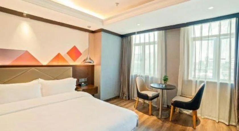 Bed in Borrman Hotel Zhongshan Henglan Xiyong