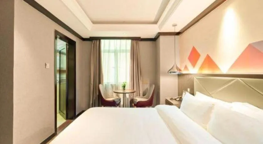 Bed in Borrman Hotel Zhongshan Henglan Xiyong