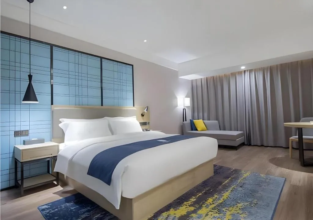 Bed in Echarm Hotel Changsha Xiangya Fushan