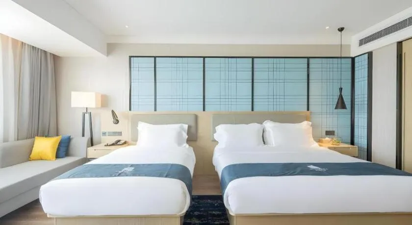 Bed in Echarm Hotel Changsha Xiangya Fushan