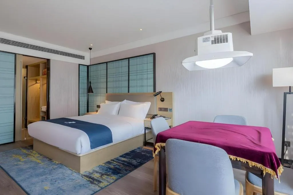 Bed in Echarm Hotel Changsha Xiangya Fushan