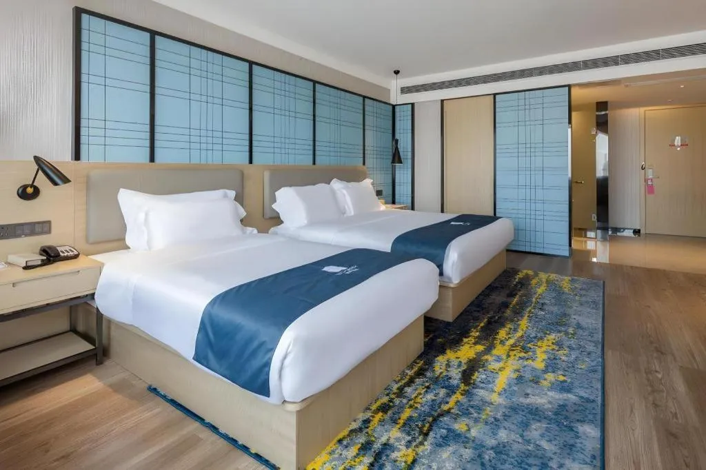 Bed in Echarm Hotel Changsha Xiangya Fushan