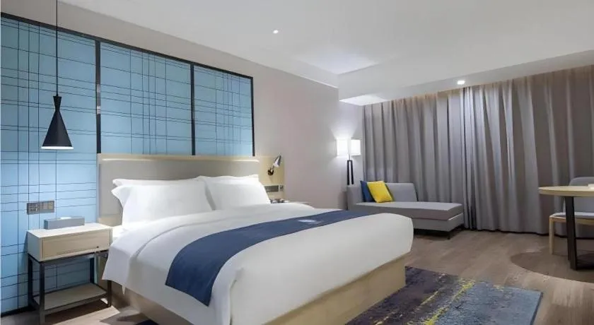 Bed in Echarm Hotel Changsha Xiangya Fushan