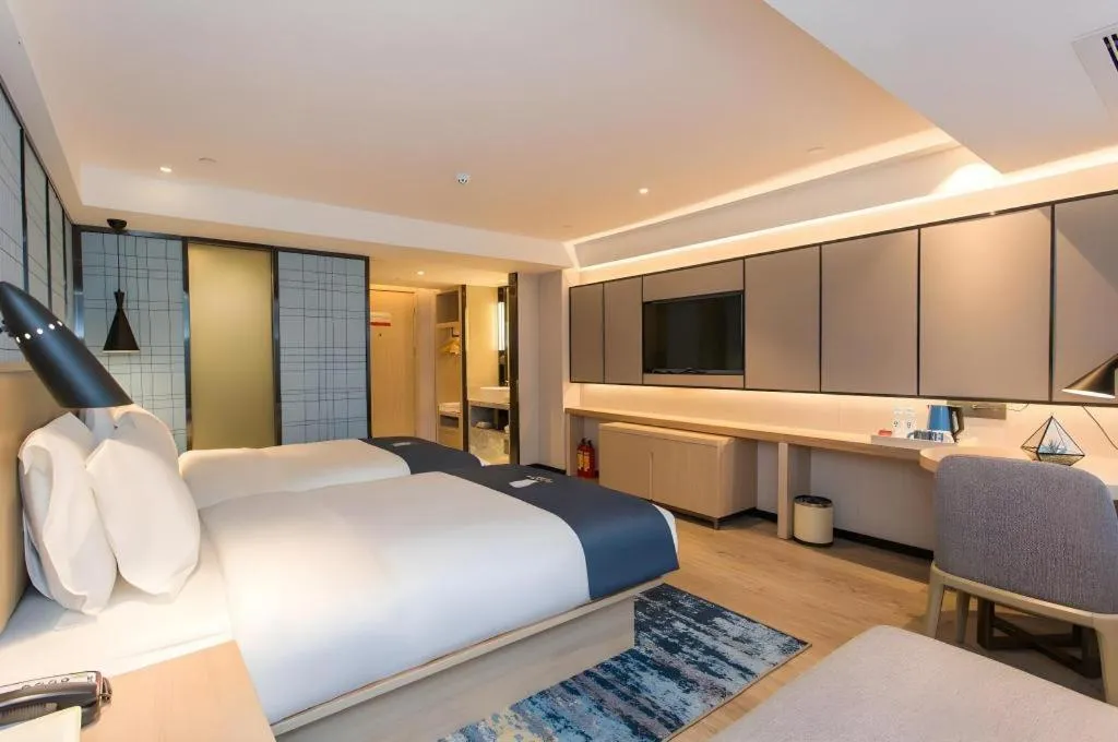 Bed in Echarm Hotel Changsha Xiangya Fushan