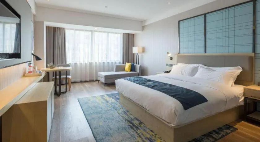 Bed in Echarm Hotel Changsha Xiangya Fushan