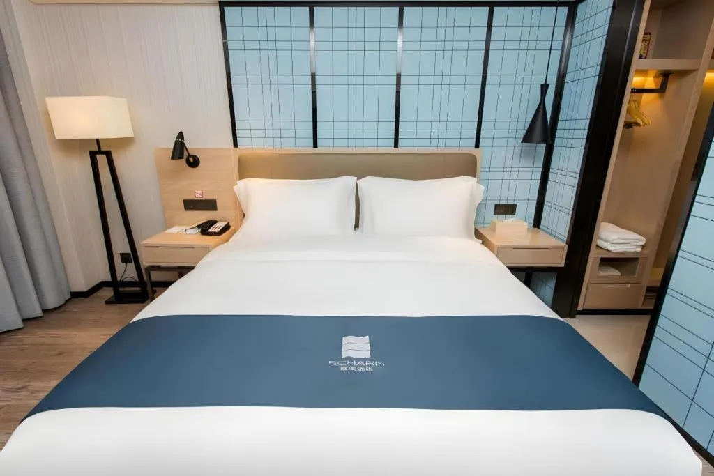 Bed in Echarm Hotel Changsha Xiangya Fushan
