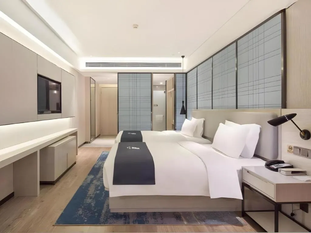 Bed in Echarm Hotel Changsha Xiangya Fushan
