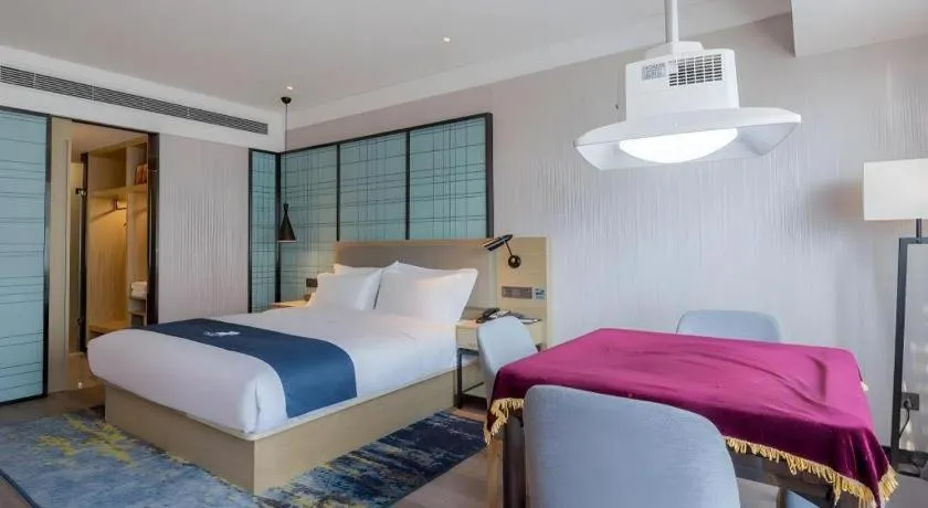 Bed in Echarm Hotel Changsha Xiangya Fushan