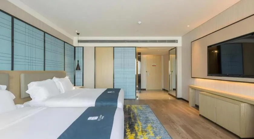 Bed in Echarm Hotel Changsha Xiangya Fushan