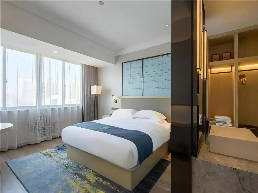 Bed in Echarm Hotel Changsha Xiangya Fushan