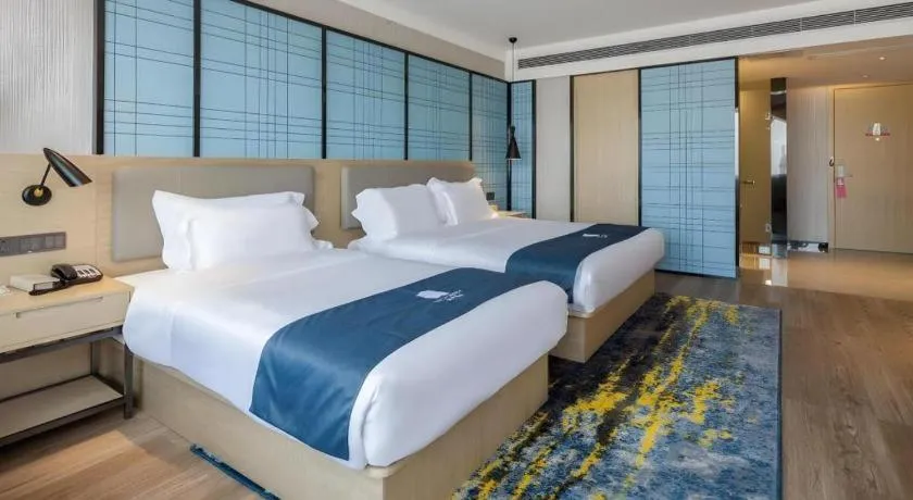 Bed in Echarm Hotel Changsha Xiangya Fushan