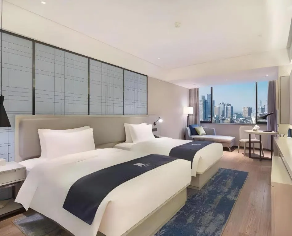 Bed in Echarm Hotel Changsha Xiangya Fushan