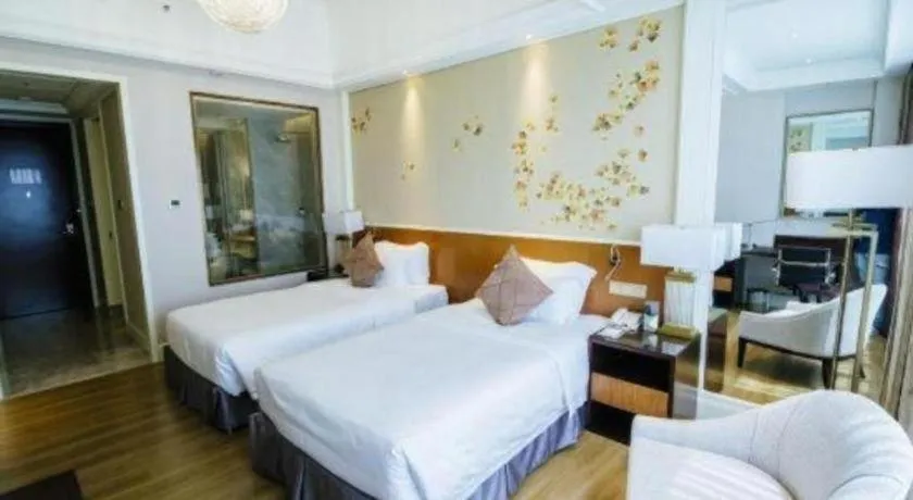 Bed in Ming Guan Hotel