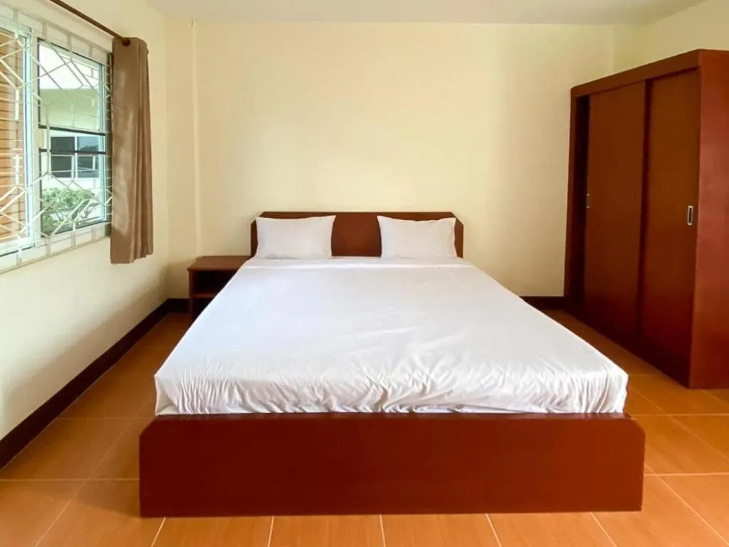 Bed in SC Palace Chiangrai Hotel