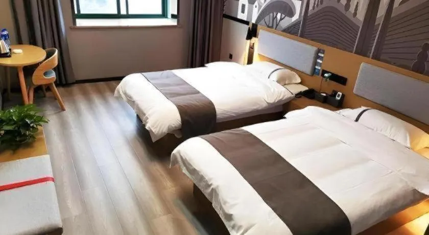 Bed in Thank Inn Hotel Anqing Guangcai Big Market Passenger Center