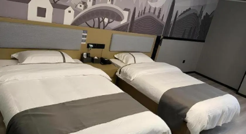 Bed in Thank Inn Hotel Anqing Guangcai Big Market Passenger Center