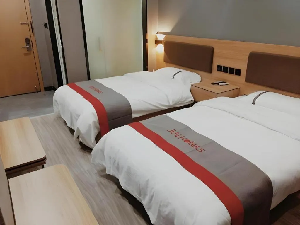 Bed in Jun Hotel Henan Sanmenxia Dennis Plaza