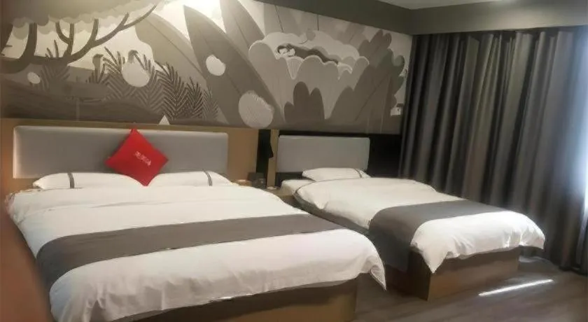 Bed in Thank Inn Hotel Guangxi Hechi Yizhou Sankeshu