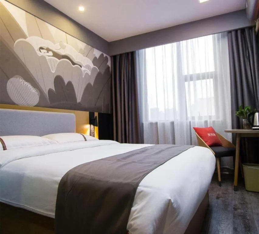 Bed in Thank Inn Hotel Guangxi Hechi Yizhou Sankeshu