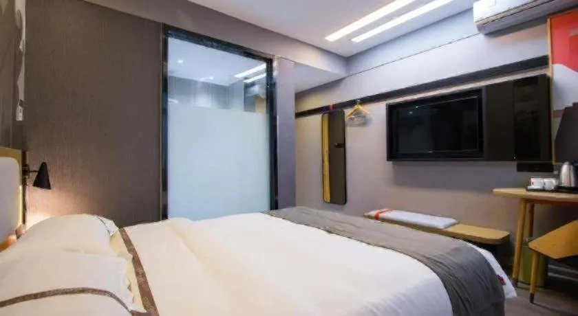 Bed in Thank Inn Hotel Guangxi Hechi Yizhou Sankeshu