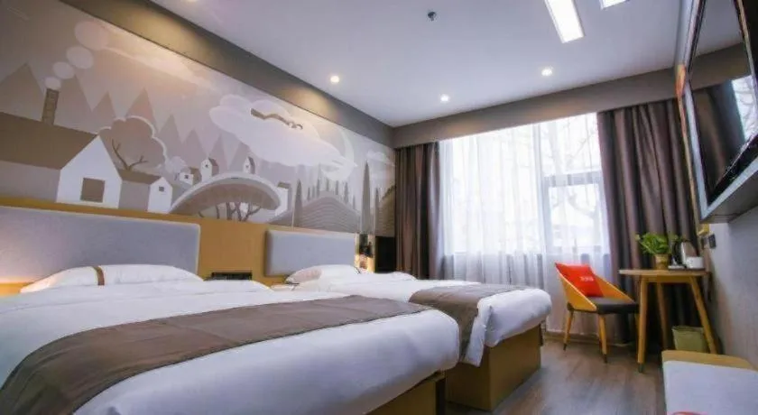 Bed in Thank Inn Hotel Guangxi Hechi Yizhou Sankeshu