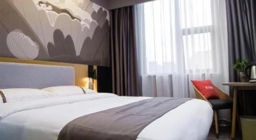 Bed in Thank Inn Hotel Guangxi Hechi Yizhou Sankeshu