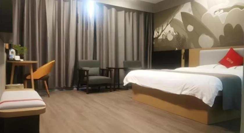 Bed in Thank Inn Hotel Guangxi Hechi Yizhou Sankeshu