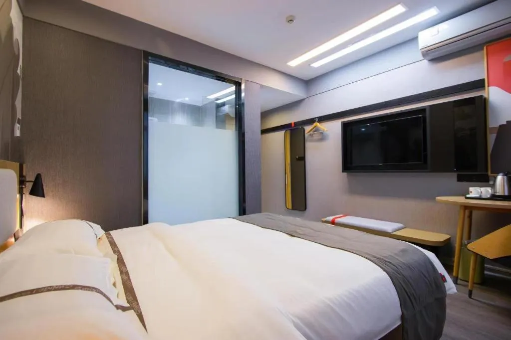 Bed in Thank Inn Hotel Guangxi Hechi Yizhou Sankeshu